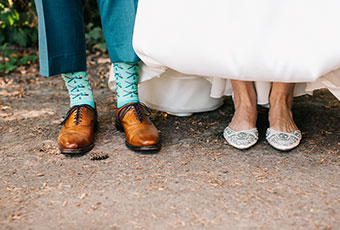 View of bride and grooms shoes